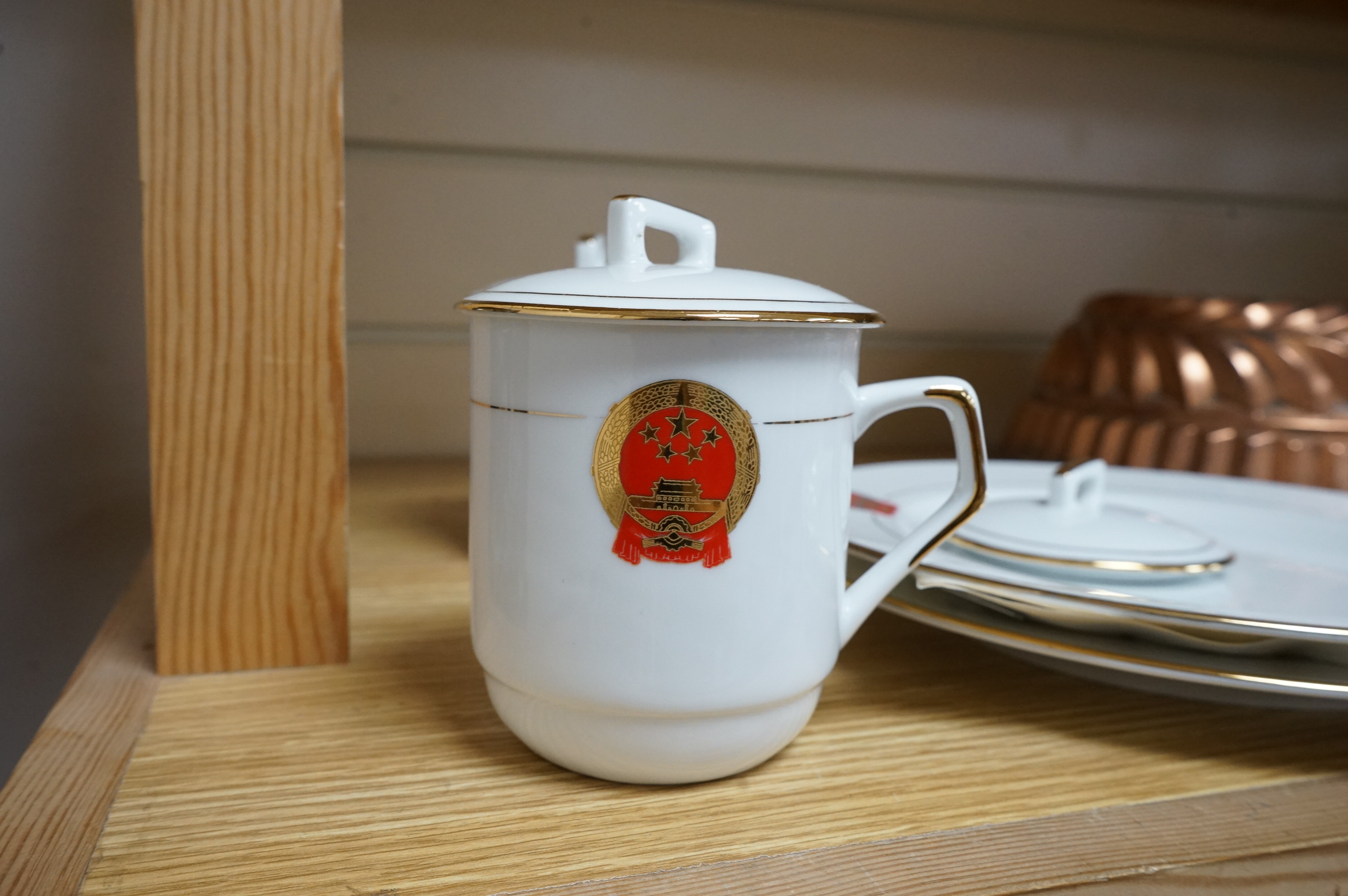 Chinese Communist Party canteen porcelain comprising two cups and two plates, largest 23cm in diameter. Condition - good